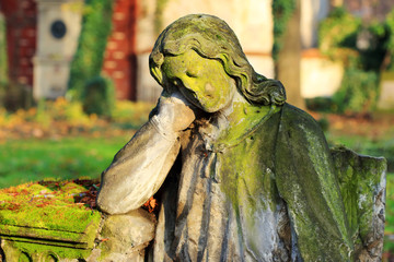 Stone Girl on Tomb from old Prague Cemetery, Czech Republic