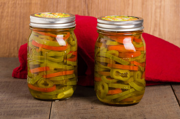 Hot pepper slices canned in mason jars