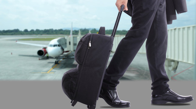 Business Travellers Walking Over The Sea