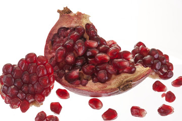 fresh fruit pomegranate isolated on white background