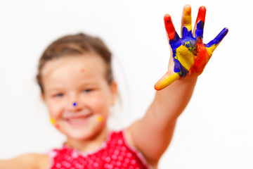 happy child with paint on the hands
