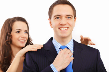 Businessman dressing at home in the morning