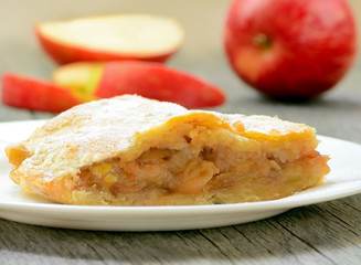 Apple pie on wooden table