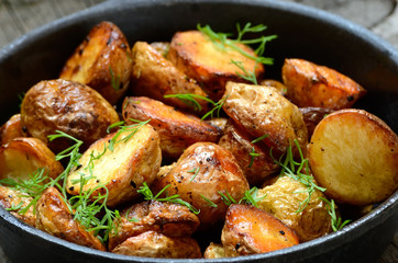 Roasted potato in a frying pan