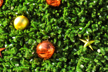 Huge christmas tree with large ornaments and lights