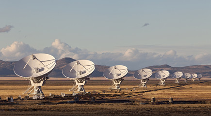 Very Large Array satellite dishes at Sunset in New Mexico, USA