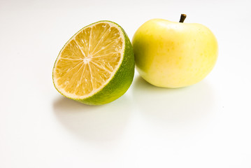 Fototapeta na wymiar Lime & apple on white background