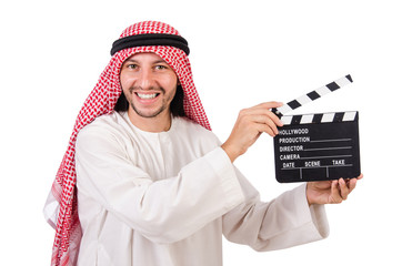 Arab man with movie clapper on white