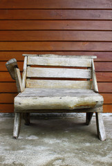 Chair with wooden wall