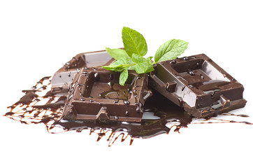 Closeup detail of chocolate parts on white background.