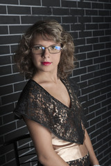 Curly girl in black dress