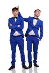 Funny men  dressed in blue suite with different emotions