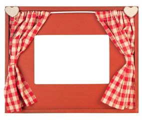 Curtain adorned photo frame on white background