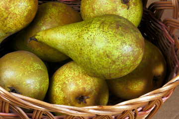 Wicker basket with pears.