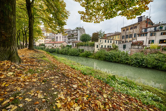 Traditional Italian Buildings by a River
