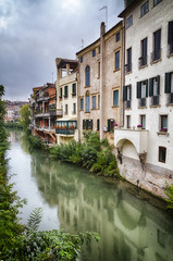 Fototapeta na wymiar Traditional Italian Buildings by a River