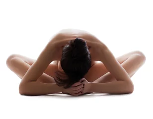 Foto op Plexiglas Close-up of slim naked girl meditates in studio © Wisky