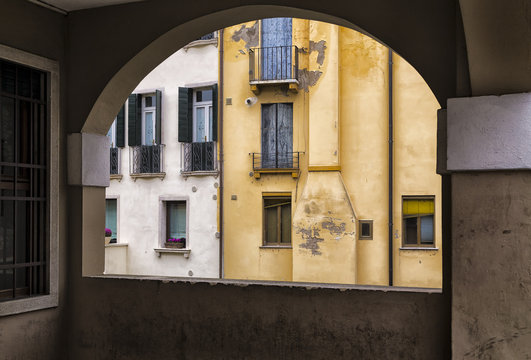 Traditional Italian Buildings Through a Balcony
