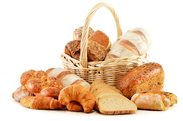 Wicker basket with baking products isolated on white