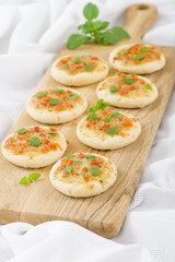 Mini Margherita Pizzas: Pizzas with tomato sauce, cheese & basil