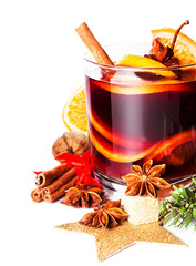 Glass with Hot red mulled wine for winter and Christmas with ora