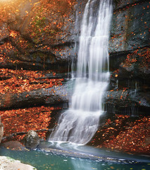Fototapeta na wymiar Autumn waterfall