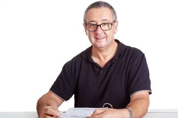 Man at desk with file folders