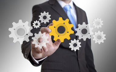 Businessman solution cogwheel concept