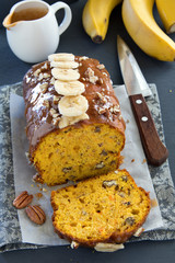 Freshly baked homemade banana bread with pumpkin and pecan.