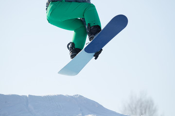 Snowboarder jumping