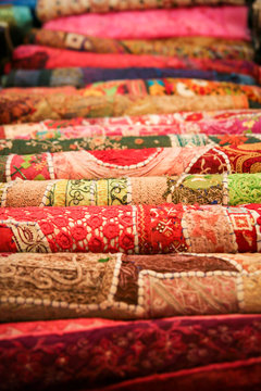 Folded pile of handmade textiles india