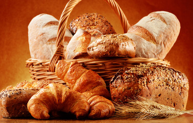 Wicker basket with bread and rolls