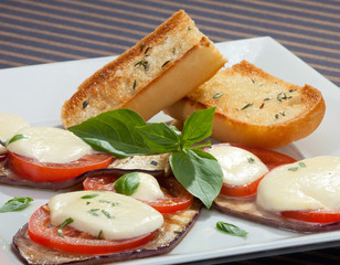 Baked aubergine w tomatoes and mozzarella