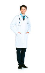 Full length portrait of the doctor standing on a white