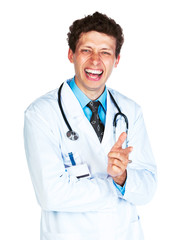 Fototapeta premium Portrait of a smiling male doctor showing finger at you on white