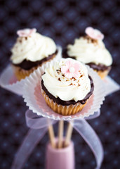 Bouquet of little cupcakes/cake pops. Selective focus