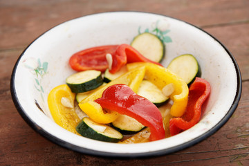 Vegatables are being prepared for grill