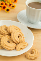 Butter cookies and a coffee cup