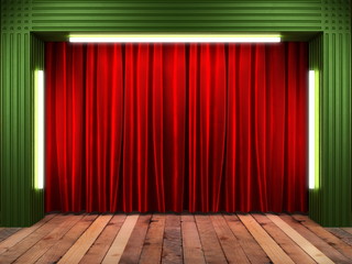 red fabrick curtain on stage