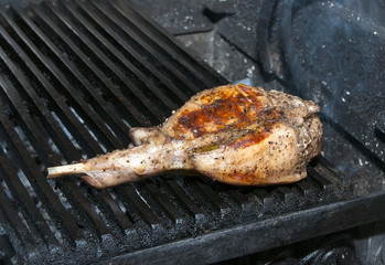 cooking rabbit meat on the grill