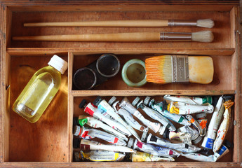 oil paint box and brushes for painting