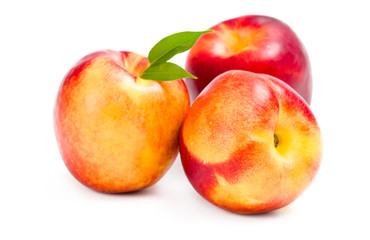 Fototapeta na wymiar Close up of three peaches, isolated on white