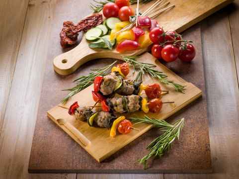 skewer with meat balls and vegetables