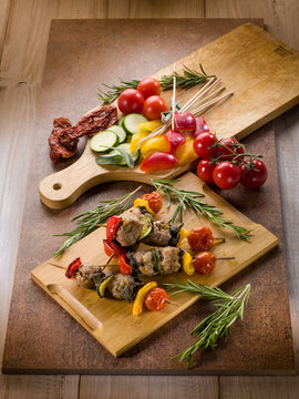 skewer with meat balls and vegetables