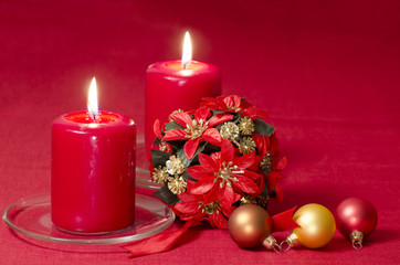 Christmas decoration with candles ribbons and cookies