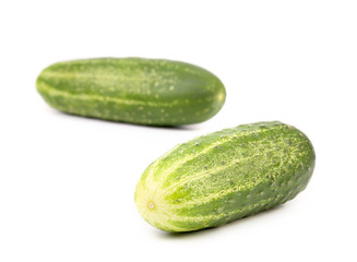 Two fresh green cucumbers.