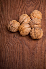 walnuts on a wooden background