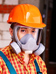 Man in builder respirator.