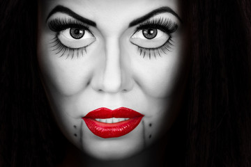 Woman face with creative make up and eyelashes