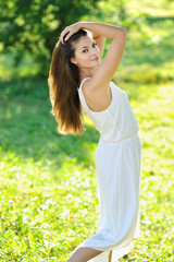 Naklejka na ściany i meble Young sensual model girl pose outdoors